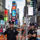 Two police officers patrol Times Square on Sept. 22, 2013, in New York City.
Andrew Burton/Getty Images